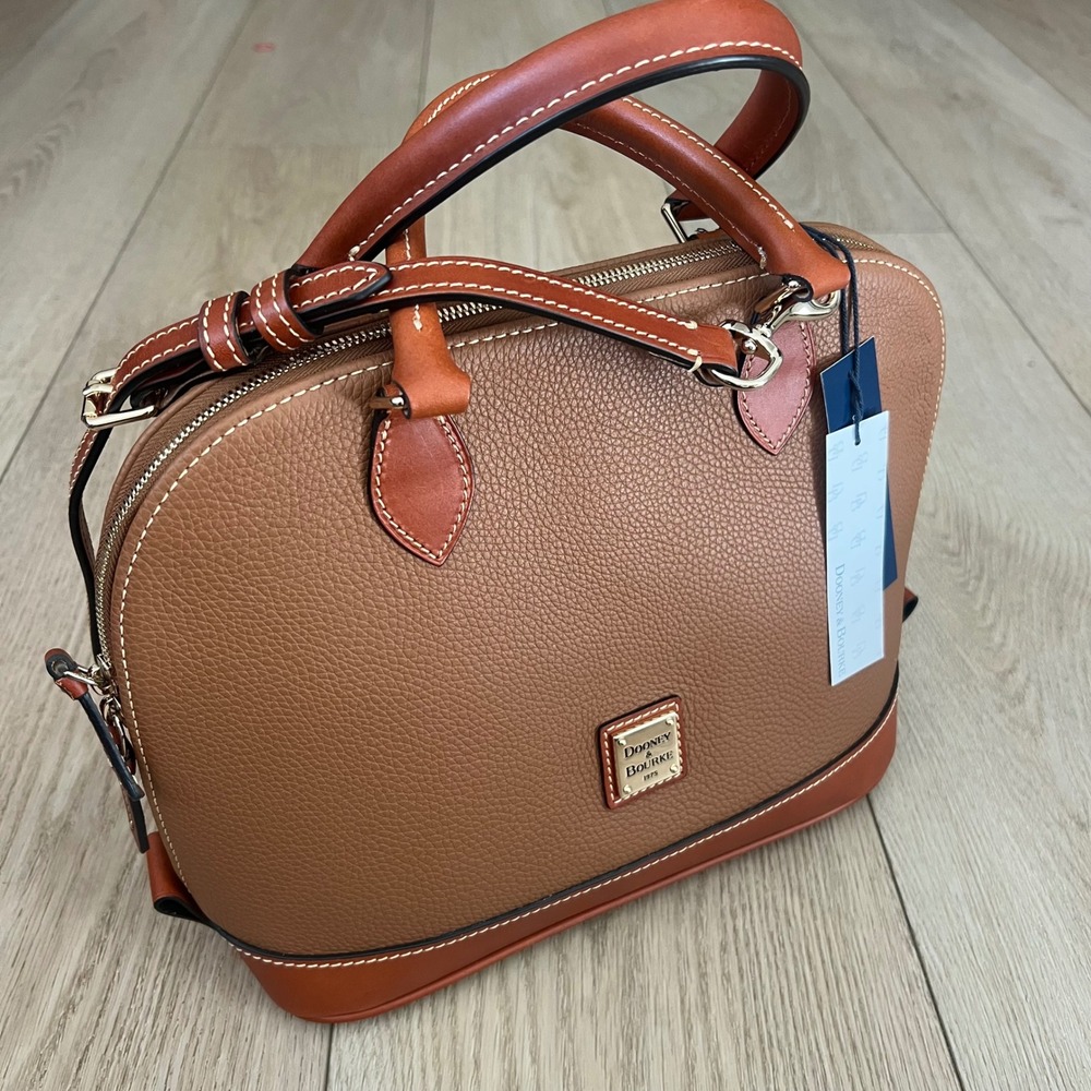 Dooney & Bourke NWT Zip Satchel Pebbled Leather Handbag.
Color Caramel